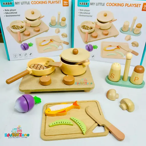 My Little Cooking Playset complete wooden kitchen toy set displayed outside its packaging, featuring a stove, frying pan, cooking pot, cutting board, toy fish, vegetables, knife and cooking accessories.